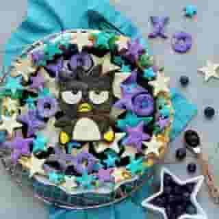 It’s #NationalBlueberryPieDay! 🥧We're celebrating with a stellar pastry inspired by our fun loving Friend of the Month, #BadtzMaru 💙Visit the link in bio for @luxeandthelady's step-by-step recipe. 