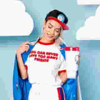 You can never have too many souvenirs✨ Grab exclusive @hellokitty Friends Around The World Tour merch at the Baggage Claim gift shop 🌈✈️ (Select styles available online soon!) Visit the link in bio to purchase your tickets to the experience today. #HelloKitty45 #1974to4ever 