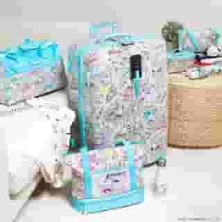 Always on the move? Get going with #Pochacco! Travel bags, suitcases and more can be found at Sanrio.com 👜💙 Shop link in bio.