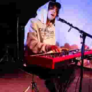 Last night,  @mrcameron_winter headlined a charity gig at the tiny venue TV Eye in Ridgewood, Queens, under the name “Chet Chomsky." The show — which raised funds for the @olivegroveinitiative, a mutual aid group that supports families in Gaza — also featured performances by @geesebandnyc's Emily Green (@afternoontr33), @leo.paterniti, @fantasyofabrokenheart, and @at__computer. Hit the link in our bio for our full recap. 📷 @grifflotz for Rolling Stone