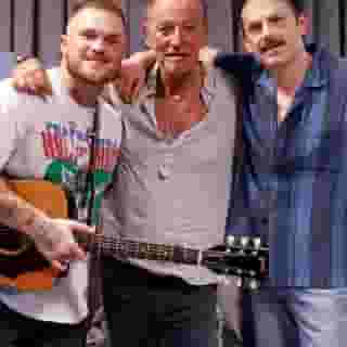 Zach Bryan (@zachlanebryan) closed out his three-night run in New Jersey with a bang, welcoming Bruce @springsteen to the stage alongside @kingsofleon's Caleb Followill to perform "Atlantic City." Watch at the link in bio. 📷 taylor.hill.photo