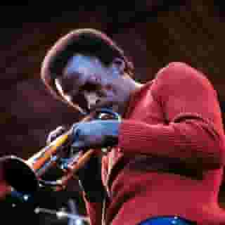 Remembering Miles Davis, who died on this day in 1970 at the age of 65. Davis' willingness to dive headfirst into new styles made him one of the most influential artists of the 20th century, a figure who transcended not just jazz but music itself. From 'Kind of Blue,' 'Bitches Brew,' and beyond, click the link in bio our for our concise guide to his 15 classic LPs. 📸 David Redfern/Redfern, Getty Images