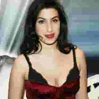 Today would have been Amy Winehouse's 39th birthday. Click the link in our bio to read our 2007 cover story on the tumultuous life of the singer.  📸 Dave Hogan/Getty Images, Peter Macdiarmid/Getty Images