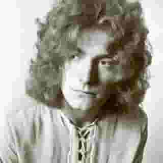 Happy Birthday to the legendary Led Zeppelin frontman Robert Plant. Tap the link in our bio to read why he is one of the 100 greatest singers of all time. 📸 Dick Barnatt/Redferns & Koh Hasebe/Shinko Music/Getty