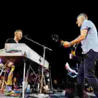 New Jersey’s very own Bruce Springsteen joined Chris Martin in a masterly duet of "Working on a Dream" and “Dancing in the Dark" at New Jersey's Coldplay concert. “Well, like Chris said, he's had this song tattooed on his arm for a while, so I guess I’ve got to sing it,” Bruce Springsteen told the crowd. Hit the link in our bio to learn more. 📸 @stevieraegibbs