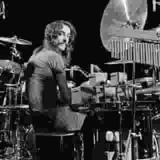 Legendary Rush drummer Neil Peart died two years ago today. Geddy Lee, Alex Lifeson and many others talked about his life and legacy in our definitive feature.⁠
⁠
Tap the link in our bio to read more. ⁠
⁠
Photo: Fin Costello/Redferns/Getty Images⁠
⁠
