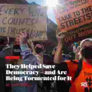 These frontline election workers made sure the votes were counted in 2020. They got death threats. Their  tormenters stormed the Capitol.⁠
⁠
Tap the link in our bio to read more. ⁠
⁠
Photo: KENA BETANCUR/AFP via Getty Images