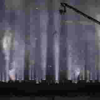 For the past several weeks, Kanye West has turned a hastily assembled studio inside of a sprawling sports arena into the world’s biggest open critique. 'Donda,' the 21-time Grammy winner’s 10th studio album, remains absent from DSPs but the world has been privy to the process of its creation in unprecedented ways. Following his July 23rd event at Mercedes Benz Stadium in Atlanta, Kanye has been holed up in the arena making alterations to the long-delayed album. Anticipation, meanwhile, has bubbled. West’s complicated career seems at a pivotal moment. The rapper has, in recent years, taken on an ecclesiastical bent. Last night, as the dome of the stadium opened, young people either circled West or crawled to him like devoted parishioners. Had the clouds rained on the heart of Atlanta that evening, Kanye West, like Noah, might have had himself his very own ark.⁠
⁠
‘Donda’ still isn’t available on streaming platforms, but after his most recent listening event, it’s apparent that he’s getting closer. Tap the link in our bio to read more.⁠
⁠
Photo by @georgeunderwood