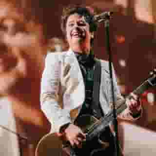 Just two songs into Green Day’s headlining set at the Hella Mega tour launch at Arlington, Texas’s Globe Life Field, Billie Joe Armstrong asked for the houselights to be turned on so he could see the roughly 35,000 people in the audience. This was quite possibly the largest rock audience that had assembled anywhere in the world since the start of the pandemic, and he wanted to bask in their glow.⁠
⁠
“Take a look around you,” he said. “This is human contact. We cannot be locked up anymore. We need to be together.”⁠
⁠
It was a sentiment shared by every performer throughout the five-and-a-half hour concert, which also featured the Interrupters, Weezer, and Fall Out Boy.⁠
⁠
Tap the link in our bio to read our Hella Mega review.⁠
⁠
Photos by @natperezphoto