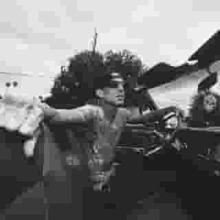 When Jaden Hossler, the TikTok heartthrob now recording moody rock songs as Jxdn, was born, the future founder of his record label was busy making 'Take Off Your Pants and Jacket.' Despite the generational gulf that separates them, the fresh-faced, freshly tatted-up, puffy-haired Hossler chose Blink-182 drummer Travis Barker’s DTA Records as his label over multiple other bidders, and enlisted Barker as his producer. He sees his elder as a musical kindred spirit, “a real-ass dude,” and “one of my best friends.”⁠⁠
⁠⁠
Barker turns 46 in November, and has three teenage kids, one of whom led him to Hossler. “I tell my friends who don’t have kids, ‘Have kids, they keep you young,’” says Barker. “I skateboard with my kids, I box with my kids…. My kids like the same music I do.” For the past year or so, he’s been thriving as one of music’s leading Gen Z whisperers, helping to midwife a youthful rock revival that owes as much to Juice WRLD as it does to Blink and mid-’00s emo. (He’s also in a relationship with Kourtney Kardashian, which he’s shy about in interviews but less so on social media.)⁠⁠
⁠⁠
“Obviously, there’s a huge pop-punk revival right now,” Barker says on a late-May day, when his studio work in L.A. ranges from the upcoming debut album from 23-year-old singer-rapper KennyHoopla to a collaboration with SoCal rockers Dirty Heads to an acoustic version of a Machine Gun Kelly track. “And rock music is on its way back. I couldn’t be more proud.”⁠⁠
⁠⁠
He’s hopeful — not for the first time in his career — that he can help serve as a bridge to a wider world of rock.⁠⁠
⁠⁠
Tap the link in our bio to read more.⁠⁠
⁠⁠
Photos by @itstrotter for Rolling Stone