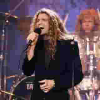 When Eddie Van Halen, Michael Anthony, and Alex Van Halen stepped onstage with their estranged singer David Lee Roth for the first time in 12 years at the 1996 MTV Video Music Awards, no one was more shocked than Mitch Malloy. Malloy, a North Dakota native with central-casting Nordic-rock-god looks and a big, radio-ready voice, says he was under every impression that Van Halen had chosen him as their new singer in the wake of Sammy Hagar’s departure from the band. Instead, within a few weeks, Extreme frontman Gary Cherone was announced as Van Halen’s new frontman.⁠
⁠
Malloy, now the lead singer for Great White and a brand-new band called Malloy, stayed silent about his experience until he revealed some of it in a mini-documentary several years back. In a new interview with Rolling Stone, he shared his most detailed account yet of his Van Halen adventure, following our memorial coverage for Eddie Van Halen, who died last October. ⁠
⁠
Tap the link in bio to read his story, in his own words, which he backed up with recordings and other documentation.⁠
⁠
Photo: NBCU Photo Bank/NBCUniversal