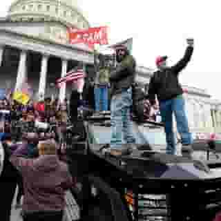 Trump supporters stand on a Capitol Police armored vehicle as others take over the steps of the Capitol on Wednesday, Jan. 6, 2021, as the Congress works to certify the electoral college votes. Link in bio for more. Photographs by Bill Clark/CQ-Roll Call, Inc/Getty Images, Tom Williams/CQ-Roll Call/Getty Images, J. Scott Applewhite/AP Images, Tayfun Coskun/Anadolu Agency/Getty Images, SAUL LOEB/AFP via Getty Images, SAUL LOEB/AFP via Getty Images