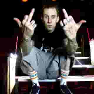 Happy 45th birthday, Travis Barker! In honor of the Blink-182 member, see where he ranks on our 100 greatest drummers of all time list at the link in our bio. Photograph by Mick Hutson/Redferns/Getty Images