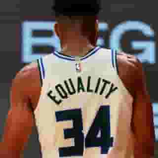 Four years to the day after Colin Kaepernick first took a knee for civil rights, Milwaukee Bucks players led a historic strike to protest police violence and systemic racism. Click the link in our bio to read Jamil Smith on why black athletes are not just here to entertain you.  Photograph by Mike Ehrmann/Getty Images