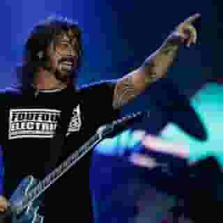 Musician Pat Finnerty staged a virtual “Grohl-A-Thon” in an attempt to persuade Dave Grohl to sing on a cover of “Money for Nothing.” “My whole fucking life has been spent looking at Grohl,” the loquacious Finnerty told us. Tap the link in our bio to learn how a "fucking nobody" from Philly got the Foo Fighters frontman to jam with him on Instagram live .Photograph by Leo Correa/AP