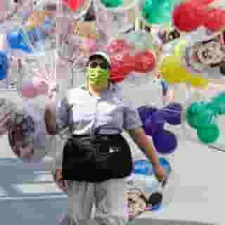 Disney World isn't quite back to normal — but despite the pandemic, it's reopening. “I just don’t think that Disney will be safe until we don’t have to wear masks to work anymore,” Kinsey Doerr, a ride operator at Space Mountain in Tomorrowland, tells us. “And I don’t think that’s [happening] anytime soon." Tap the link in our bio for what it’s like to work at the amusement park during a pandemic. Photograph by Andy Martin Jr./ZUMA