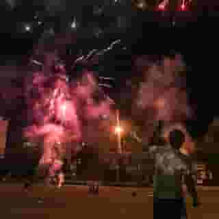 Many are convinced that the government is handing out fireworks to cause chaos — but the truth behind the recent craze might be more complicated. Tap the link in our bio to learn more about why the fireworks conspiracy theories are so damn believable. Photograph by Stephanie Keith/Getty Images