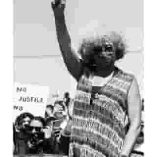 On Juneteenth, Angela Davis protested at the Port of Oakland as longshoremen shutdown 29 ports along the West Coast. Photograph by @ruffdraft