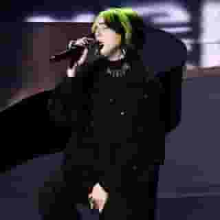 Billie Eilish performed a sulky cover of the Beatles’ “Yesterday" during the In Memoriam segment at the #Oscars. Tap the link in our bio to watch. Photograph by Kevin Winter/Getty Images