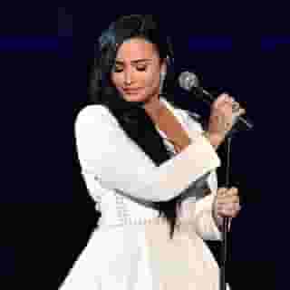 @ddlovato premiered a new song, "Anyone," in her first live performance in two years at the #GRAMMYs. Link in bio to watch her full performance. Photograph by Rob Latour/Shutterstock