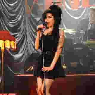 We had an exclusive look at the Amy Winehouse Grammy Museum exhibit, which features some of the singer’s most memorable outfits as well as never-before-seen handwritten lyrics, journal entries, and home videos. Link in bio for more. Photograph by Richard Young/Shutterstock