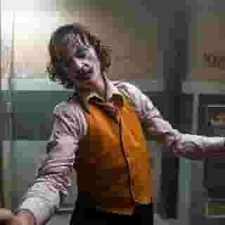 Todd Phillips and Joaquin Phoenix’s 'Joker' story of the most infamous villain in Batman’s rogues gallery is itself as interesting as any of the character’s adventures either on screen or the printed page. Click the link in our bio for our guide to the Caped Crusader’s deadliest enemy, from his first comic-book appearance to his reinvention as a cinematic agent of chaos. Photograph by Niko Tavernise/Warner Bros. Pictures