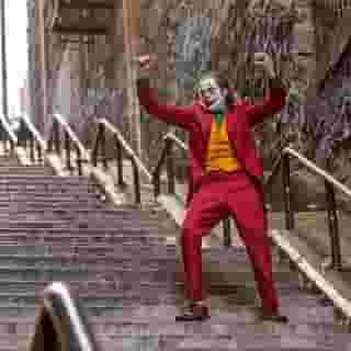 Yes, Joaquin Phoenix delivers a chilling Joker for our current moment — but WTF is this blockbuster trying to do? Tap the link in our bio to read our #TIFF19 review of 'The Joker.' Photograph by Niko Tavernise/Warner Bros. Pictures⁠
