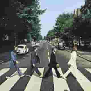 The Beatles were photographed crossing Abbey Road 50 years ago today, resulting in one of the most iconic album covers of all time. At the link in our bio, Rob Sheffield settles an age-old debate about the album. Courtesy of Apple Corps