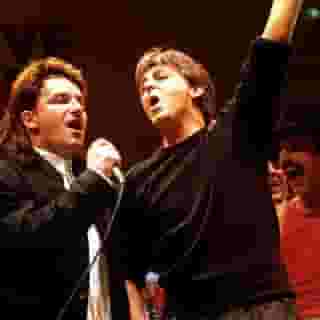 Remember the summer of '85? #StrangerThings is taking us back. From Guns ’N Roses performing together for the first time to "Summer of '69" by Bryan Adams hitting the Top 10, click the link in our bio for 11 unforgettable music moments from that year. Photograph by PA Images/Getty Images