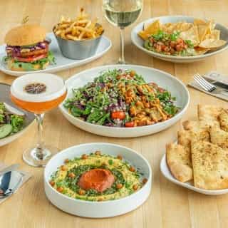 Celebrate World Vegan Day with us! 🌱⁠
⁠
Join us today and enjoy some of our favourite plant-based dishes: ⁠
🍽️ Vegan Hummus & Za’atar Flatbread⁠
🍽️ Vegan Mediterranean Falafel Bowl⁠
🍽️ Vegan Falafel Burger⁠
🍽️ …and more!
