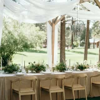 "Between every two pine trees there is a door leading to a new way of life" - John Muir. This nature-inspired reception is perfectly nestled in the Sierra Mountains. The Cashmere Plush Velvet linens add that touch of luxury without distracting from the surrounding scenery. ⁠
⁠
Photography: @loganalexander.co⁠
Venue: @chaletviewlodge⁠
Design/Planning: @samanthaheskett⁠
@loganalexander.co⁠
Catering: @blackhatcateringco⁠
Film: @highsierrafilmco⁠
Floral: @hanafloralstudio⁠
Drapery & Trusses: @itsallinthedetails1⁠
Music: @brianhessmusic⁠
Bar Rental: @sacramentoeventco⁠
Bartending: @blackhatcateringco⁠
Dinner Chair Rentals: @sacramentoeventco⁠
Ceremony Chairs:@linenandoakrentals⁠
Tabletop Rentals: @honeybee.rentals @camelotpartyrentals⁠
Decor: @arrangeeventrentals⁠
Linens: @creativecoverings⁠
Beauty: @mebeautyhairandmakeup⁠
Content: @contentwithkels_⁠
Cake: @sweettoothbakingco⁠
Stationery: @thepaintedpapier⁠
Gown/Veil: @edenaharon_hautecouture @bridetobecouture⁠
Mini Dress: @hhco_baygowns⁠
Hats: @shopzandria⁠
Signage: @lindawilmarthdesigns⁠
Tux: @tuxedodenca⁠
Rings: @beyond_the_alley_jewelry⁠
Bride: @amandaencelan⁠
Groom: @rhysdesota⁠
⁠
⁠
#creativecoverings #luxurylinens #weddingideas #weddingtable #weddinginspo #tablescape #eventtrends #eventdesign #weddingreception #receptionideas #naturewedding #outdoorwedding