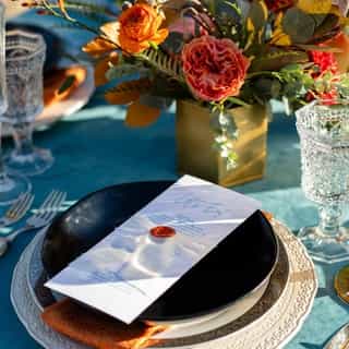 Looking for a color combination as bold as your love? Try pairing our Ocean Plush Velvet linens and Mandarin Tavira napkins with vibrant warm-toned florals. ⁠
⁠
Venue: @olympicvalleystables ⁠
Rentals: @standardeventrentals ⁠
Photographer: @amanda_kluesner_photography ⁠
Linens: @creativecoverings ⁠
Florist: @create_with_t ⁠
Stationery: @cainandcostationery⁠
⁠
⁠
#CreativeCoverings #SpecialtyLinens #WeddingTable #EventDesign #WeddingInspo #Tablescape #TablescapeDesign #WeddingMoodBoard #EventProfs #EventTrends #ColorfulWedding⁠