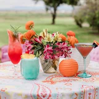 Playful, punchy, and full of personality ☀️ Our Charleston Paisley linen brings just the right amount of color to any celebration. Whether you’re styling signature cocktails, a welcome party, or a poolside reception, this linen is ready to make a splash. ⁠
⁠
Design, Planning & Florals | @loricoleevents⁠
Lead Photographer | @karissawrightphotography⁠
Team Content Creator | @champagnecontentco⁠
Venue | @weddings_at_the_bird_ranch⁠
Gowns | @aw.bridal⁠
Suits | @tuxedosoflodi⁠
Wedding Cake | @jesuitnugas.cakes⁠
Rentals | @standardeventrentals⁠
Vintage Furniture | @aq.vintage.rentals⁠
Bartending | @berniesmixology⁠
Rings | @vailcreek⁠
Live Artist | @art_by_audie⁠
Clydesdales | @slrclydesdales⁠
Hats | @the_hbar⁠
Linens | @creativecoverings⁠
Engraving & Calligraphy | @writeonxokat⁠
Models | @yeseniaangulo1 @britboyce_ @daderpie @aa.alicia_angulo⁠
@alantovar_reyes⁠
⁠
⁠
⁠
⁠
#creativecoverings #specialtylinens #tropical #summer #outdoorwedding #weddingtable #cocktailhour #tablescape #eventinspiration #weddingreception #beachwedding #weddingideas #eventinspiration #eventthemes #eventdecor⁠