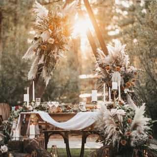 We can’t get over how beautifully enchanted this forest wedding was 🌲 The candles surrounding the setting and the linens draped over the table completed the look perfectly.⁠
⁠
See the entire gallery on the Love in the Lost Sierra blog from the link in our bio!⁠
⁠
Venue: @chaletviewlodge⁠
Photographer: @vildphotography⁠
Linens: @creativecoverings⁠
Florist: @helianthusfloral