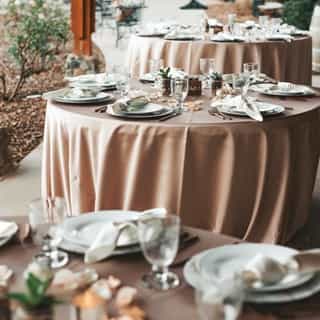 Those summer neutrals never get old ✨We love the way this bride incorporated blush colored rose petals as around her centerpieces!⁠
⁠
See more of the Almond Dupioni linen from the link in our bio.⁠
⁠
📍Saluti Cellars, Somerset, CA⁠
⁠
Venue: @saluticellars⁠
Catering: @bonneviekitchen @catskitchen_⁠
Linens: @creativecoverings⁠
Makeup: @solsticesalontruckee⁠
Hair: @alyssadevonhair⁠
Guitarist: @miltonmerlos.weddings⁠
DJ & Photo Booth: @momentstomemoriesdj⁠
Lighting: @sacramento_theatrical_lighting⁠
Rentals: @celebrationseventrentals⁠
Cake: @flourgirlweddingcakes⁠
Florals: @coutureweddingsbydottie and @love_and_lupines⁠
Photography: @drishti_studio⁠
Planner: @stephaniemarieco