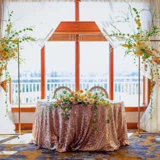 Pink isn't just for February, we love it all year long. ☀️ With the blush geometric sequin you can let your linens shine! ⁠
⁠
Throwback to this gorgeous sweet heart table from the 2022 Wedding Showcase Tasting we attended at The Club at Snoqualmie Ridge. ⛰ @clubsrweddings⁠
⁠
The Blush Geometric Sequin is a sheer fabric embroidered with golden pink sequins in a geometric pattern. Because it is used as an overlay, we love it paired over navy or platinum tones. It’s the perfect way to add a multi-dimensional look to your event with the added glitz and glam of sequin!⁠
⁠
View all of our geometric sequin colors from the link in our bio. ✨⁠
