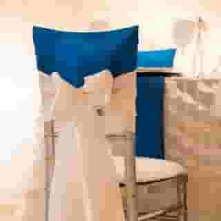 Boring chairs? We got you covered!⁠
⁠
Chiavair Chair Cap | Ultramarine Crush⁠
Sash | White Dupioni⁠
Linen | White Petal Tafetta⁠
Napkin | Ultramarine Crush⁠
⁠
Design | Seasons by David @seasonsbydavid