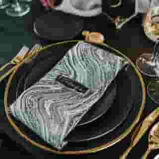 Metallic touches of gold are trending and they really pop against the black and marble here! 🖤⁠
⁠
Napkin | Steam Marble⁠
⁠
Design | Stephanie Teague Events @stephanieteagueevents⁠
Photography | Liz Zimbelman Photography @lizzimbelmanphoto⁠
Venue | Kimpton Sawyer @sawyerhotel⁠
Florals | J Blooms @j.blooms_⁠
Furniture Rentals | Found Rentals @foundrentals⁠
Tabletop Rentals | Hensley Event Resources @hensleyeventresources⁠
Linens | Creative Coverings @creativecoverings⁠
Paperie Menu, Table Number and Place Cards | Paper String Shop @paperstringsshop⁠
Marble Place Cards and Table Number | Letters From Eden @mylettersfromeden⁠
Bar Menu | Once Write @oncewrite⁠
⁠
#creativecoverings #weddingideas #eventideas #eventinspo #weddinginspo #wedding #events #eventplanner #eventplanning #eventdecor #eventdesign #eventlinens  #weddinglinens #linenideas #tabledecor #tablescape #linenrental #steammarble