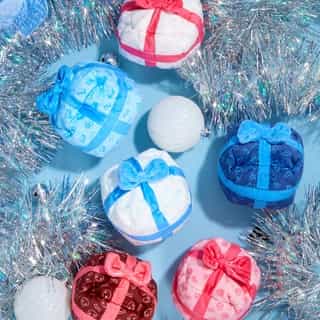 Swipe for a holiday surprise! 🎄💖 Shop the newest Hello Kitty and Friends @teeturtle reversible blind boxes at the link in our bio. 