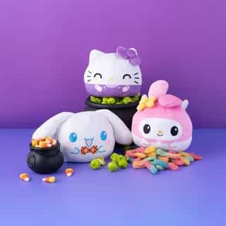 Sweet on one side 🍬 Spooky on the other 👻 Get double the charm with @HelloKitty and Friends Halloween reversible @teeturtle plushies! Link in bio to shop.