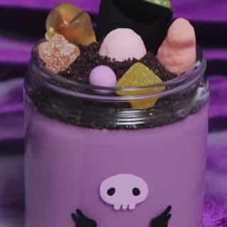 Make this sweet and spooky “dirt” cup dessert with the Kuromi x @Sugarfina Halloween Collection 🎃🍬 Link in bio to watch on the #HelloKittyandFriends YouTube channel! 