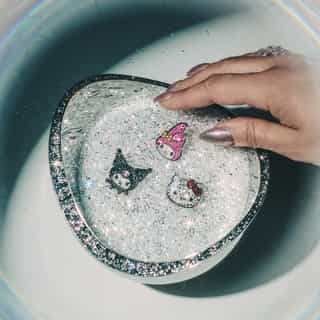 Say hello to sparkles ✨ Shop the new @Crocs Hello Kitty and Friends @Swarovski Jibbitz on Sanrio.com! Link in bio.