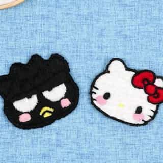 Want to make your t-shirt supercute? This DIY Hello Kitty and Badtz-maru patch tutorial is just what you need! Watch on the #HelloKittyandFriends YouTube. Link in bio. 