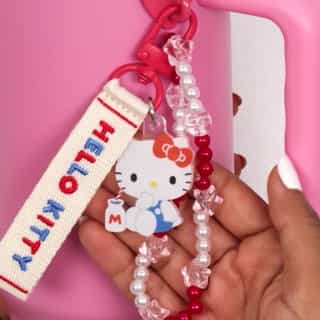 Hello Kitty and Friends water bottle charms with Sanrio Character Award Series keychains on the #HelloKittyandFriends YouTube channel! Make sure to vote for your favorite Sanrio friend! Link in bio to watch.