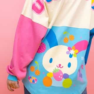 Colorblock and cute! 🌈 🩷The @japanla U*SA*HA*NA Spirit Jersey is available now on Sanrio.com! Link in bio to shop.