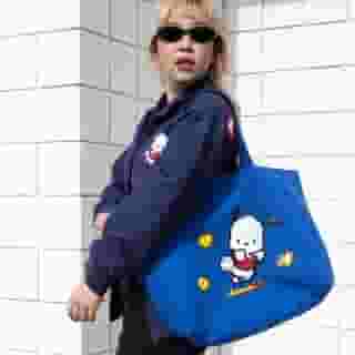 Sporty and stylish 💙❤️ Shop the @japanla Pochacco jacket and tote bag now! Link in bio to shop at Sanrio.com.