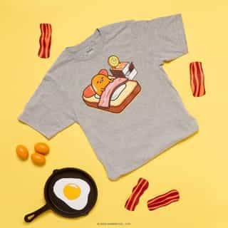 Breakfast in bed… 🥚🥓 Tag a lazy friend who needs this month’s Sanrio T-shirt Club design! Link in bio to join.  