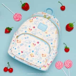 Represent your favorite fluffy puppy, Cinnamoroll, with the adorable @loungefly backpack available at @officialfye! 💙 Link in bio.