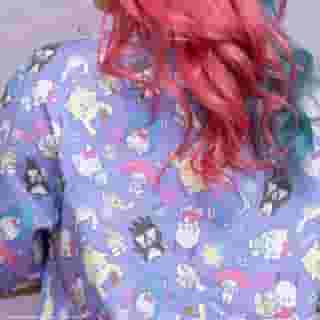 BOO! 👻 Stay spooky all year long with the new Hello Kitty and Friends button up shirt by @japanla! Link in bio.