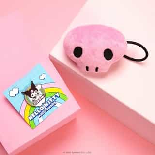 New month, new gifts featuring #Kuromi! 🌈💞 Get our collectible Friend of the Month pin and Kuromi hair tie FREE when you spend $40 or more in Sanrio stores and online - no code needed! Link in bio to shop. #SanrioFOTM